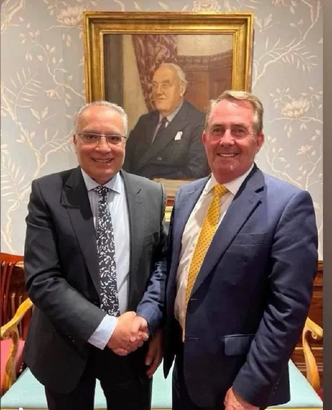 With Sir Liam Fox